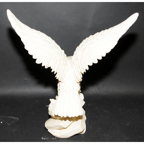 47 - Large alabaster figure of an eagle signed A Giannelli 35cms tall with 35cms wingspan