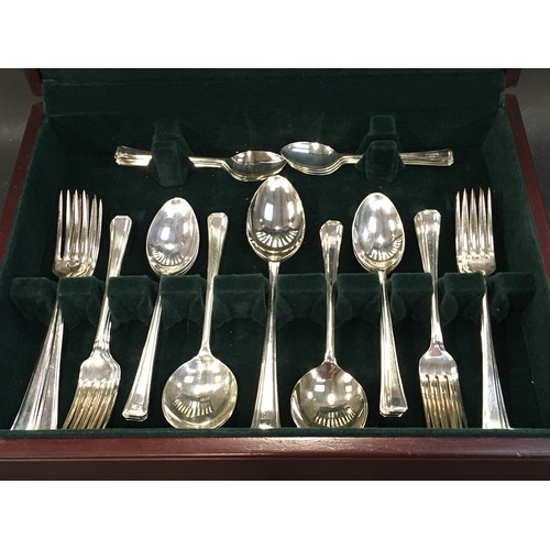 499 - Arthur Price of England wooden cased cutlery canteen. Complete for six place settings.