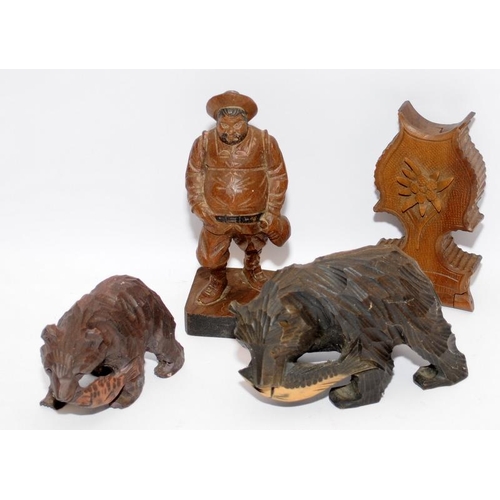 48 - Collection of artisan carved figures in the Black Forest style including a pocket watch stand. Eight... 