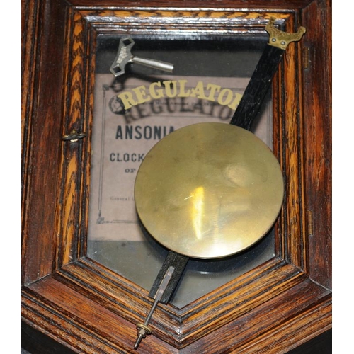 370 - Ansonia Regulator wall clock in octagonal case. Good clean example seen working. Ref9