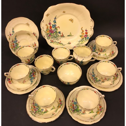 118 - Crown Staffordshire fine bone china tea set for six with extras in a decorative floral pattern. 23 p... 