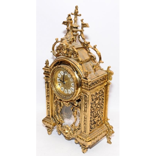 375 - Two mantel clocks, a heavy gilded cast metal quartz example and a wooden mechanical striking clock, ... 