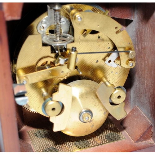 375 - Two mantel clocks, a heavy gilded cast metal quartz example and a wooden mechanical striking clock, ... 