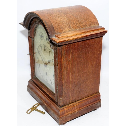 385 - Vintage oak cased Keinzle mantel clock with fast/slow and chime/silent sub dials. 37cms tall, seen t... 