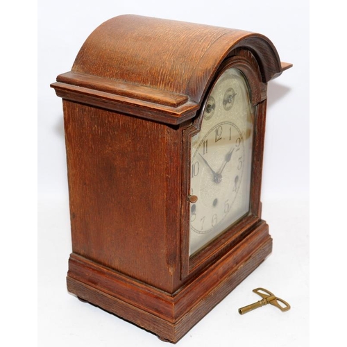 385 - Vintage oak cased Keinzle mantel clock with fast/slow and chime/silent sub dials. 37cms tall, seen t... 