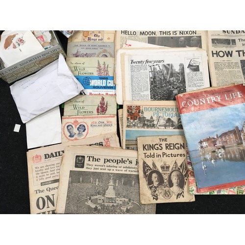 243 - Suitcase containing a large collection of ephemera, vintage newspapers, cigarette cards and stamps. ... 