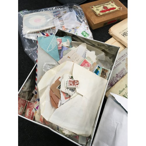 243 - Suitcase containing a large collection of ephemera, vintage newspapers, cigarette cards and stamps. ... 