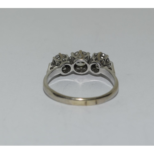 397 - 18ct white gold three stone diamond ring approx 1ct Size Q.