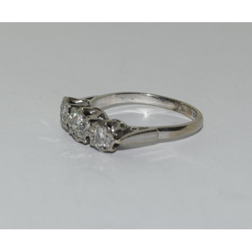 397 - 18ct white gold three stone diamond ring approx 1ct Size Q.