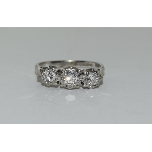 397 - 18ct white gold three stone diamond ring approx 1ct Size Q.