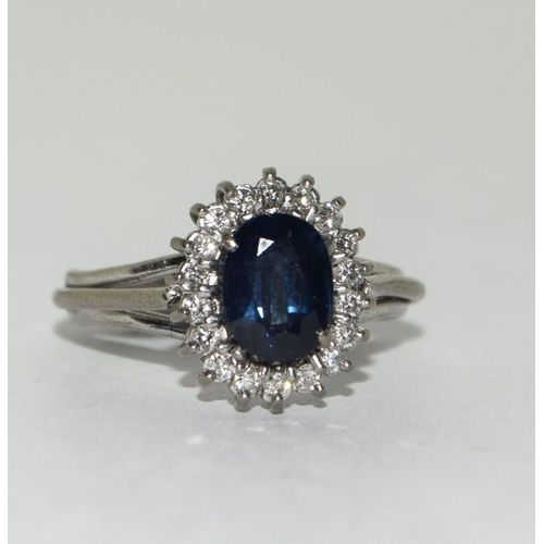 372 - 18ct white gold diamond and sapphire ring Size L