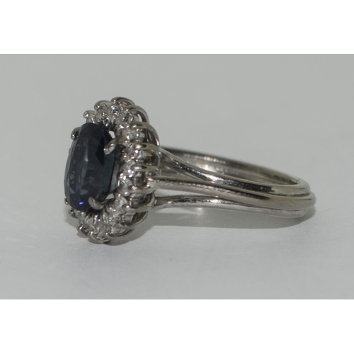 372 - 18ct white gold diamond and sapphire ring Size L