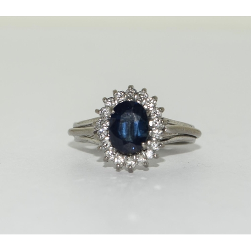 372 - 18ct white gold diamond and sapphire ring Size L