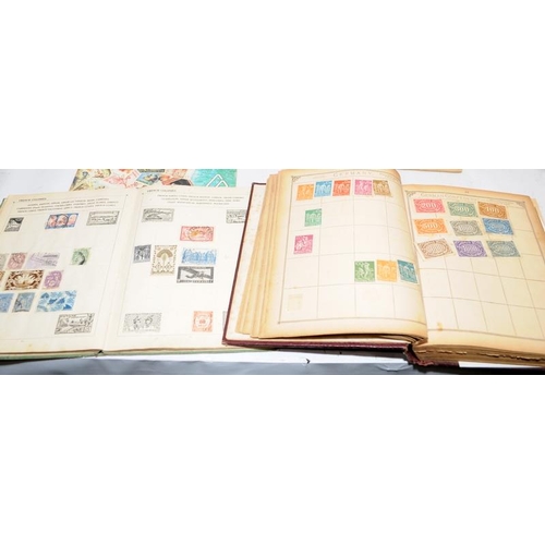 220 - A number of vintage schoolboy stamp albums containing many world stamps. Includes Penny Black, Penny... 