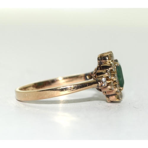 437 - 14ct Gold Diamond and Emerald cluster ring. Size Q.