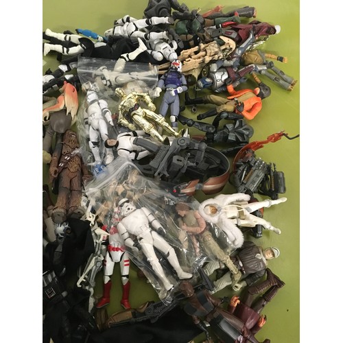 12 - Approx 100 Star Wars modern figures.