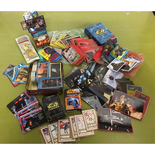 13 - Collection of Star Wars collector cards and games cards.