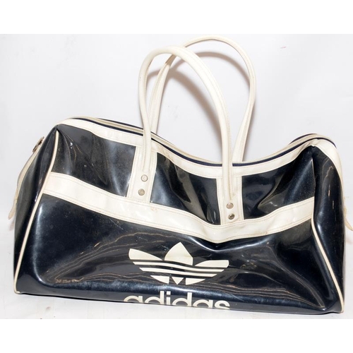 163 - Vintage large shiny vinyl adidas sports/weekend bag. Dark blue, 52cms along the bottom, smooth zip a... 