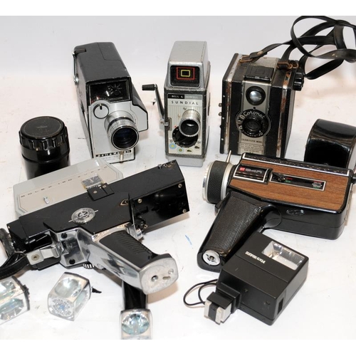 121 - Collection of vintage cameras and accessories to include cine cameras, slide and film projectors, le... 