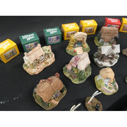 99 - Various Lilliput lane collectors badges, miniature cottages some boxed, lilliput lane mini figures a... 