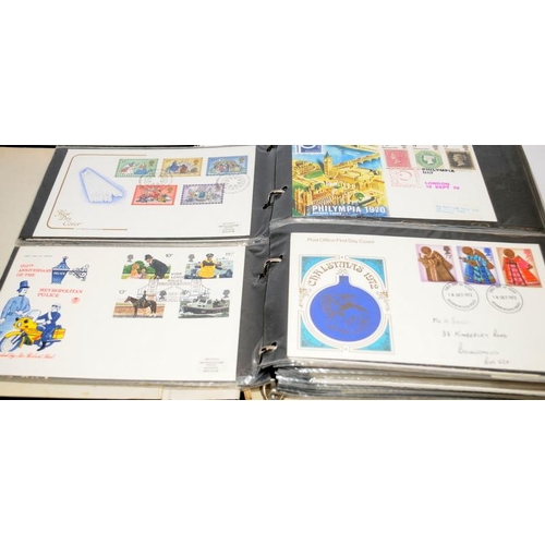 223 - Four large albums of mostly GB first day covers