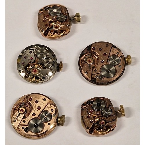 335 - 4 Omega manual wind 1 tudor Royal wristwatch movement.