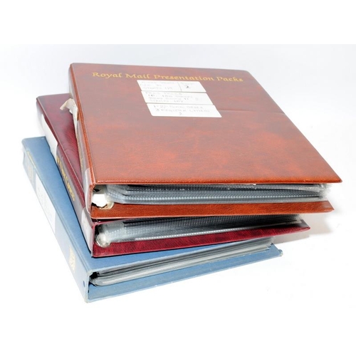 227 - Three stamp albums containing first day covers, presentation packs and related items