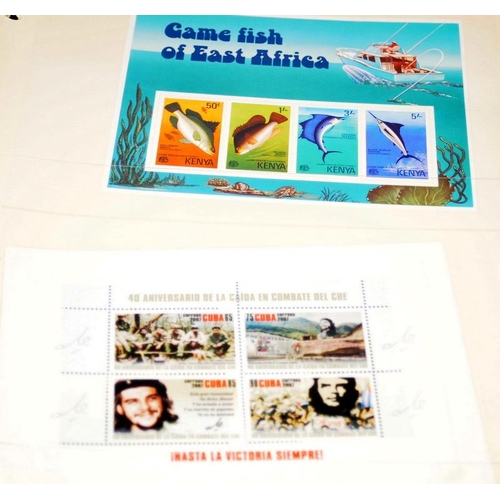 229 - Two stamp albums, one with world first day covers and the other dedicated to stamps of Papua New Gui... 