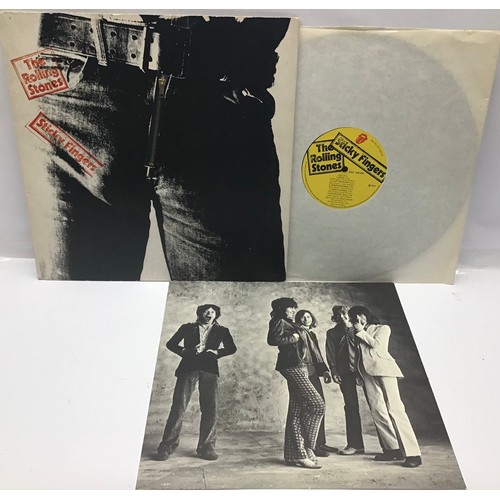 145 - STICKY FINGERS LP FROM THE ROLLING STONES. This LP was released in 1971 and has the Andy Warhol desi... 