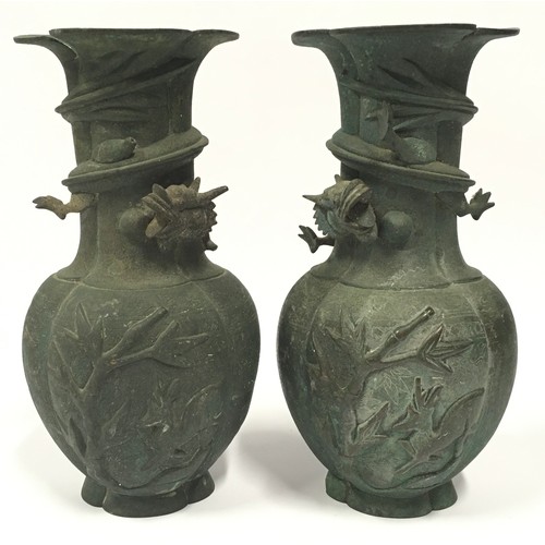 4 - Pair of antique cast metal oriental vases with stamped marks to bases. Each measures 26cm tall.