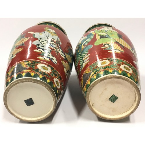 1 - Pair of oriental ceramic vases each measuring 31cm tall.