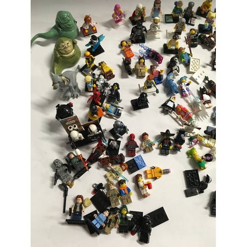 31 - 100+ Lego mini figures to include Star Wars, Batman, Wizard of Oz and others.