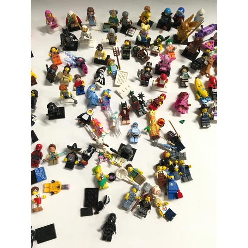 31 - 100+ Lego mini figures to include Star Wars, Batman, Wizard of Oz and others.