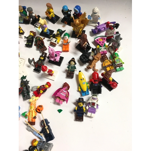 31 - 100+ Lego mini figures to include Star Wars, Batman, Wizard of Oz and others.