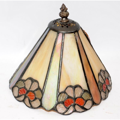 139 - Two coloured lampshades in the Tiffany style. The largest is 30cms across