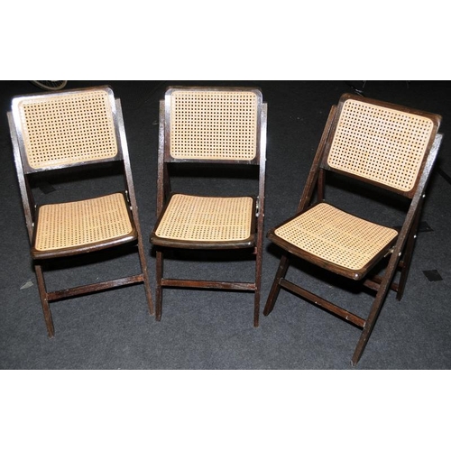 528 - Three vintage wood and rattan slim folding chairs in good order. Seat height 45cms