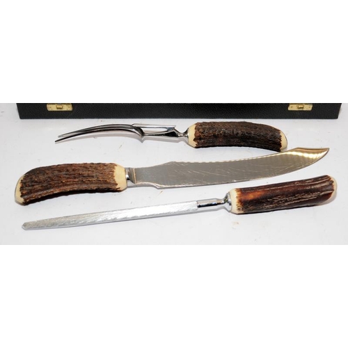 515 - George Butler of Sheffield.3 piece carving set with stag horn handles presented in original box