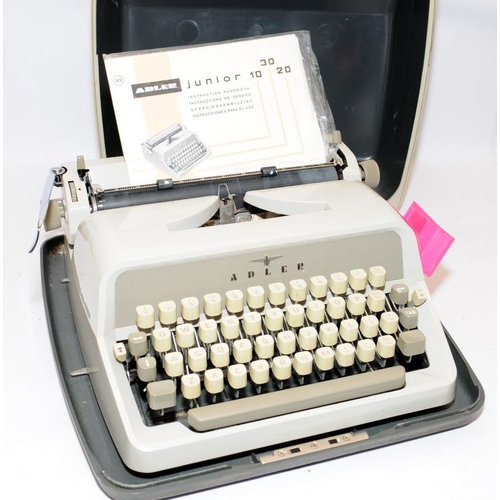 80 - Two vintage typewriters, an Adler Junior 20 c/w user guide and a Brother De Luxe 900 with spare ribb... 