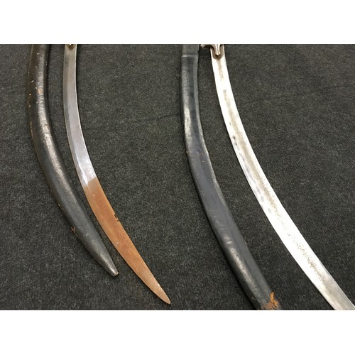 116 - Pair of antique swords with leather sheaths.