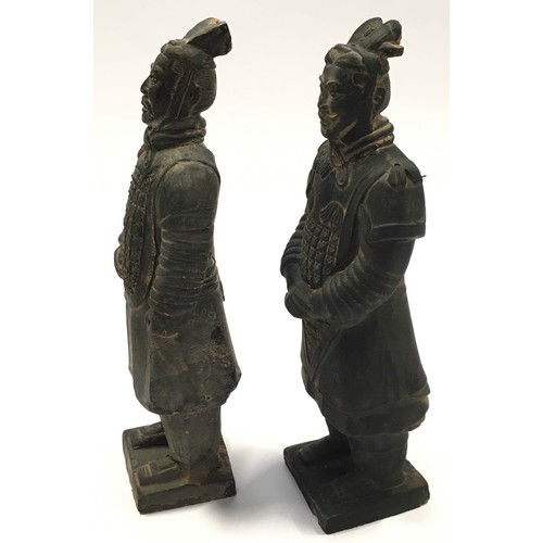 52 - Pair of miniature terracotta warrior figures the tallest measuring 23cm in height.