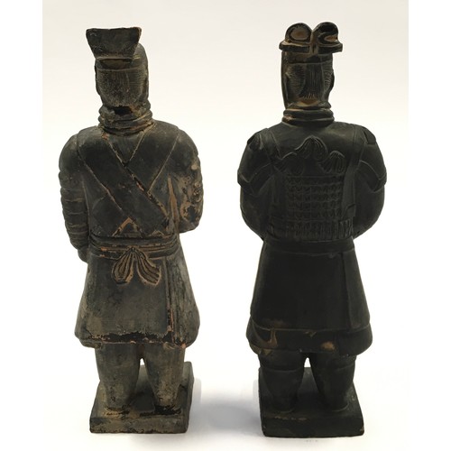 52 - Pair of miniature terracotta warrior figures the tallest measuring 23cm in height.