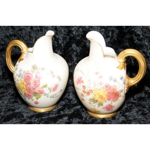 36 - Pair of antique Royal Worcester blush ivory gilded flat back jugs with hand painted floral decoratio... 