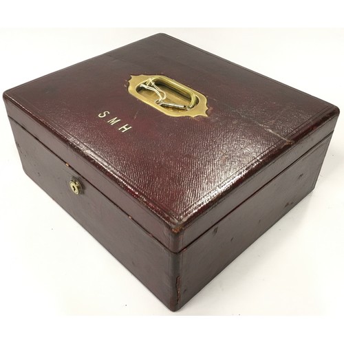 137 - Leather travelling jewellery box with hidden compartment with a Bramah lock & key. Watered silk inte... 