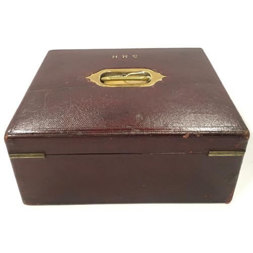 137 - Leather travelling jewellery box with hidden compartment with a Bramah lock & key. Watered silk inte... 