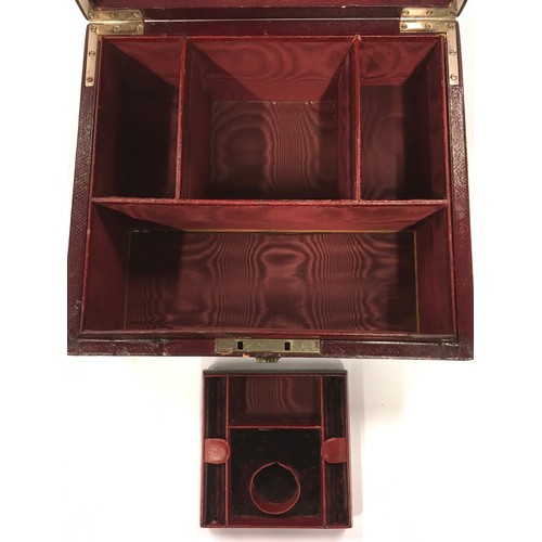 137 - Leather travelling jewellery box with hidden compartment with a Bramah lock & key. Watered silk inte... 