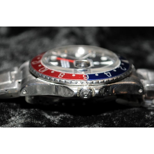 25 - A Rolex GMT Master 1968, Model 1675, Rolex service dial,  bezel etc, Rolex folded link bracelet 7836... 