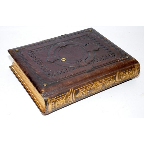 214 - Victorian musical photograph album with gilded tooled leather boards. Good cosmetic condition. no ke... 