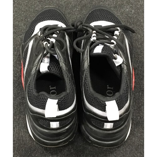 9 - A pair of Dior Homme leather sneakers in black and grey, with dust bag size 10/44