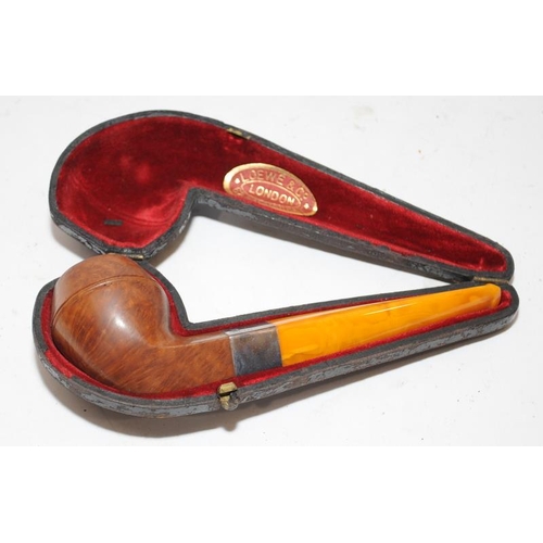 258 - Quality antique Loewe & Co pipe with hallmarked silver collar and butterscotch amber stem. Presented... 