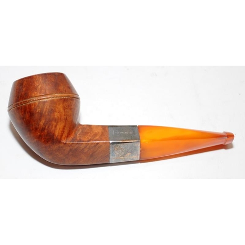 260 - Two quality antique pipes with hallmarked silver collar and butterscotch amber stem. Presented in un... 